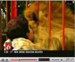 Lion hugs rescuer Lion hugs rescuer